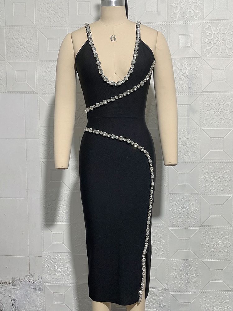 Black halter dress with zipper front and diamond accents, featuring a backless design and tight fit.